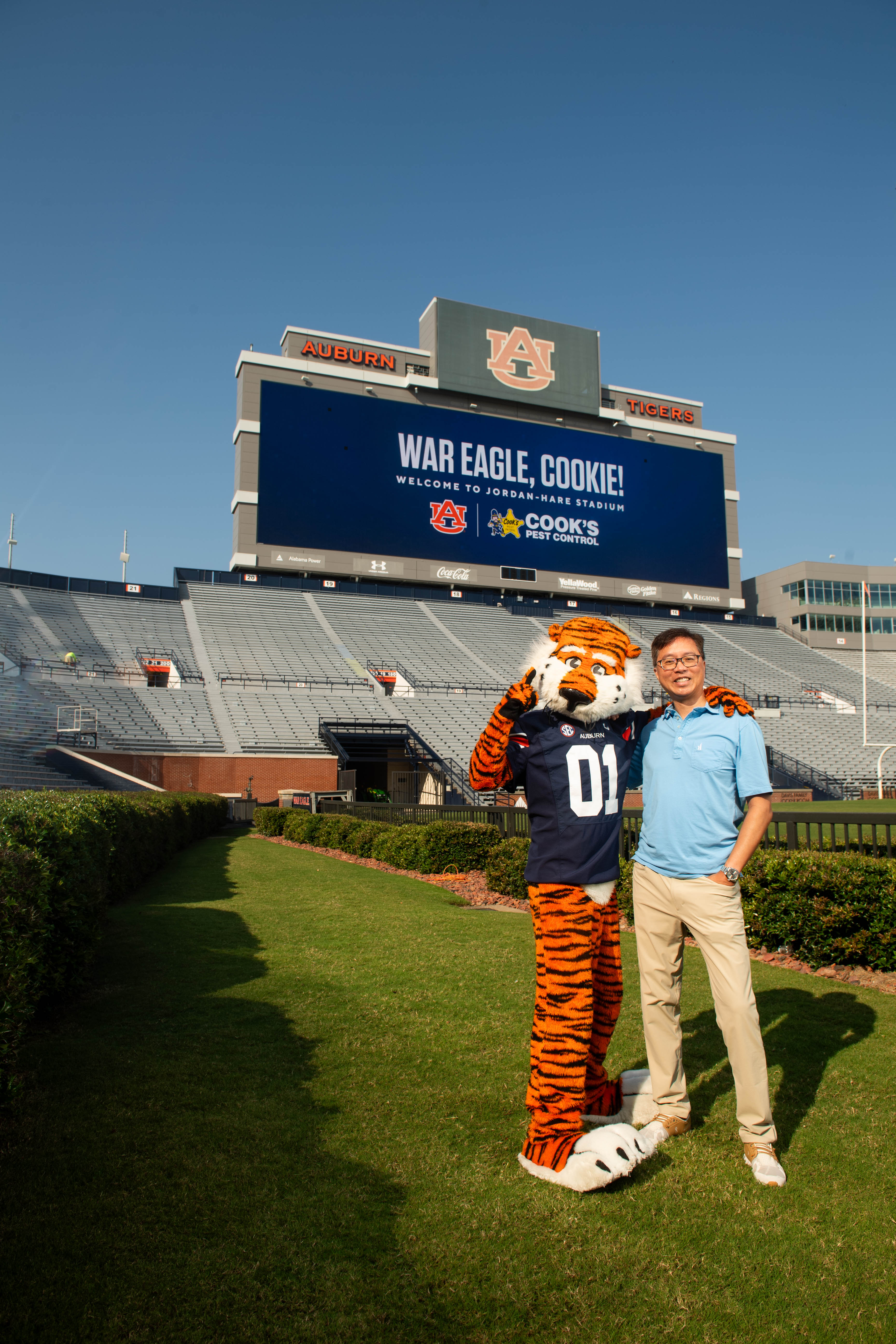 Jonathan Moral with Aubie at Jordan-Hare Stadium beneath a War Eagle, Cookie welcome board